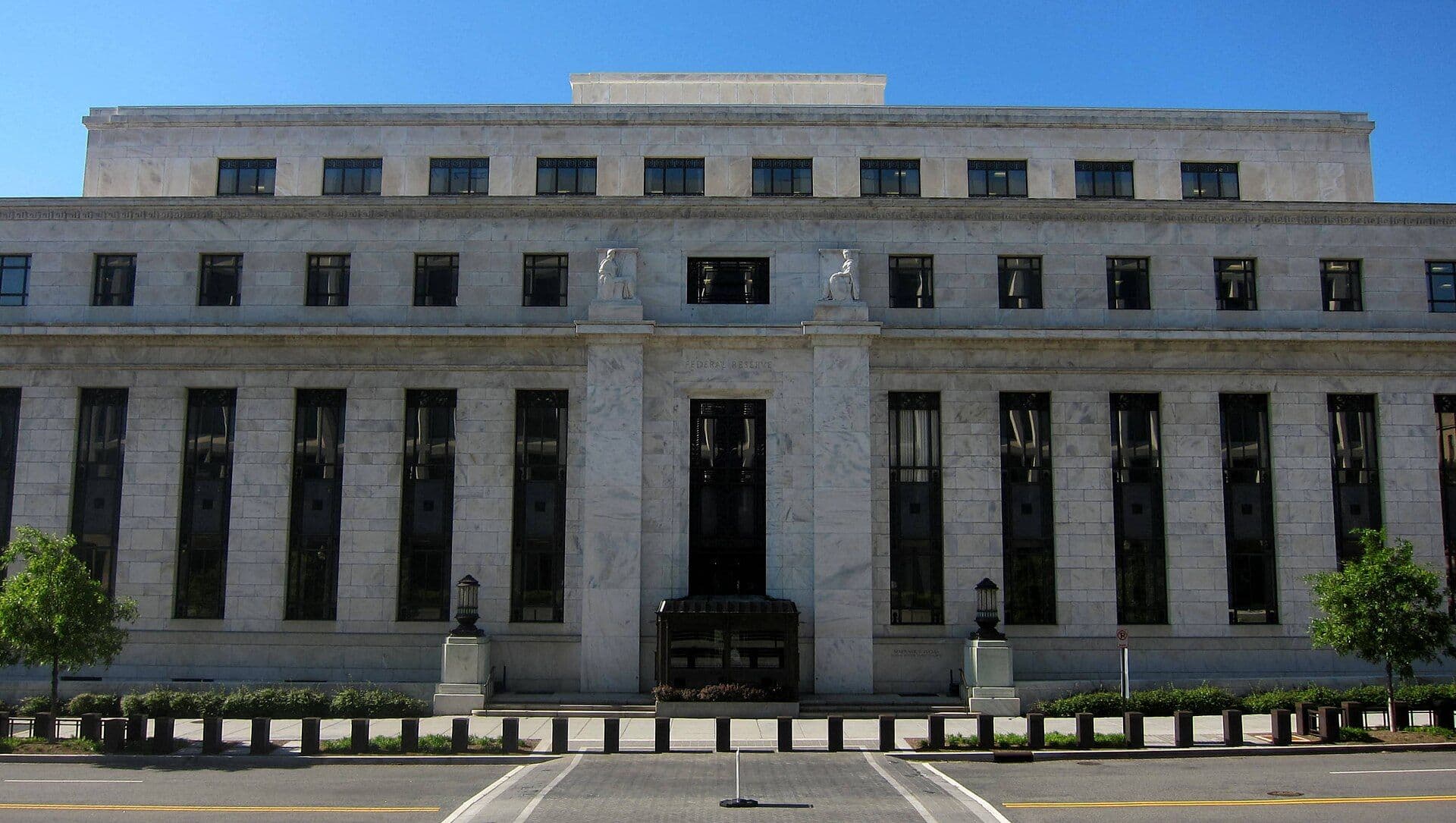 Neoclassical facade of the Eccles Federal Reserve Board Building with symmetrical columns and windows
