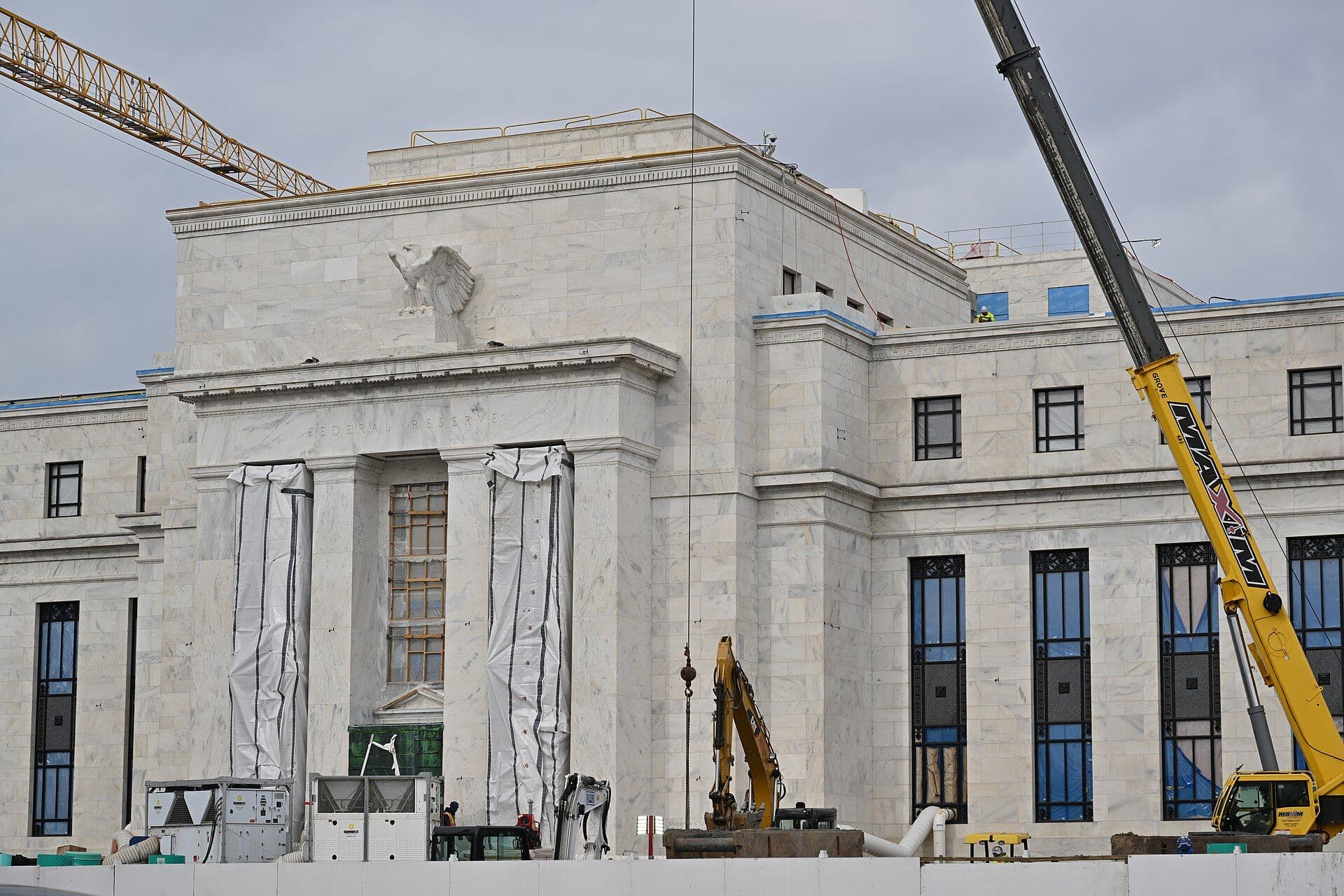 Eccles Federal Reserve Board Building with construction cranes and equipment