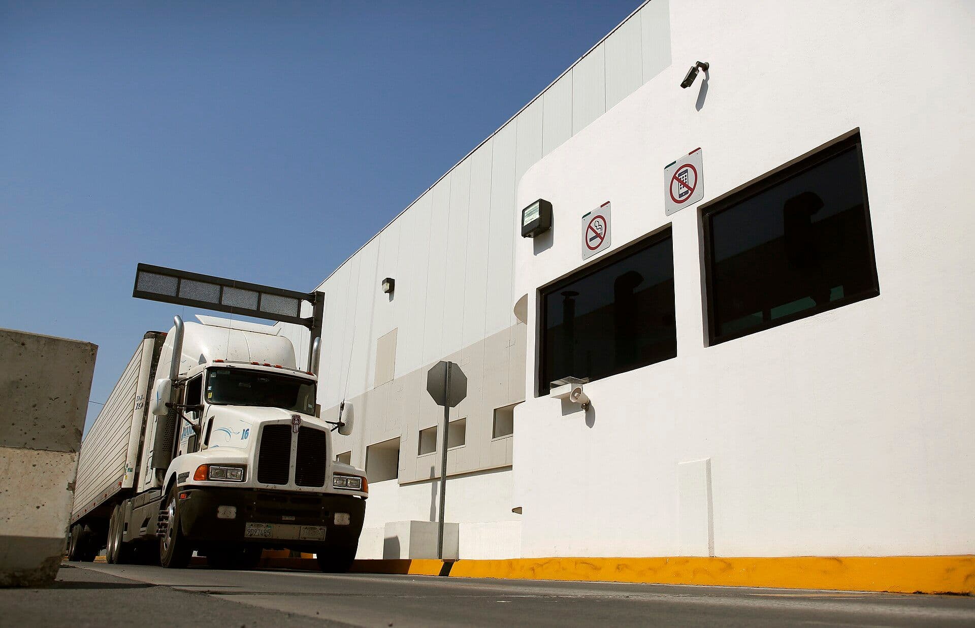 A tractor trailer carrying imports from Mexico at a U.S. checkpoint facility